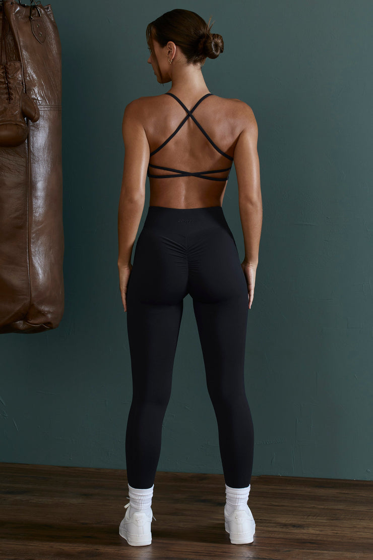 Growth - Scoop Neck Open Back Sports Bra in Black