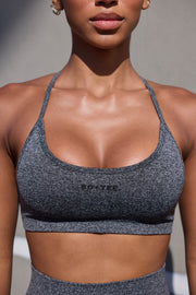 Movement -  Super Sculpt Seamless Open Back Sports Bra in Marl Black