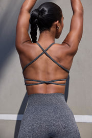 Movement -  Super Sculpt Seamless Open Back Sports Bra in Marl Black